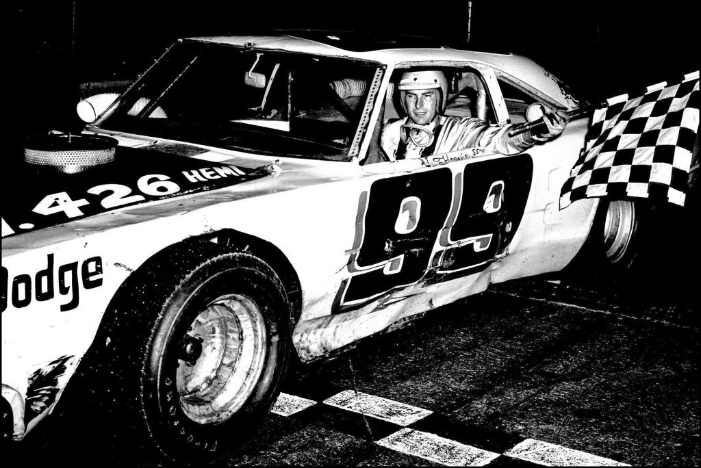 Howie Scannell takes the Checkers at Flamboro Speedway. Photo by Tex
