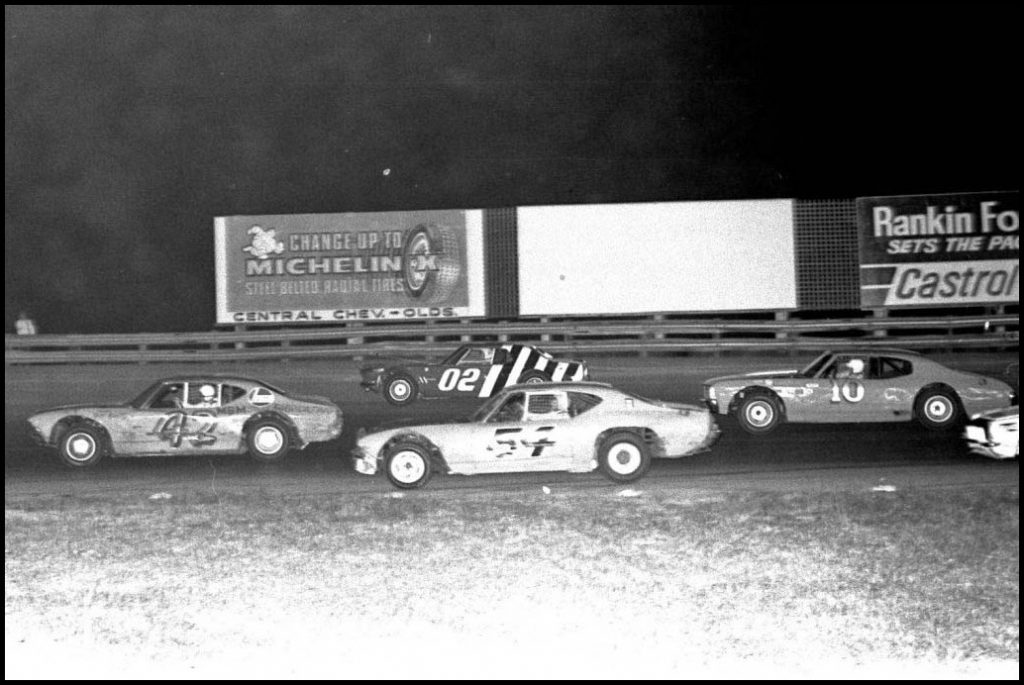 Jerry Makara #42, Brian Setterington #54,Kirk DeRosier's #02, and Harold Brown #10 racing for position at Delaware Speedway. Courtesy of Brian Norton