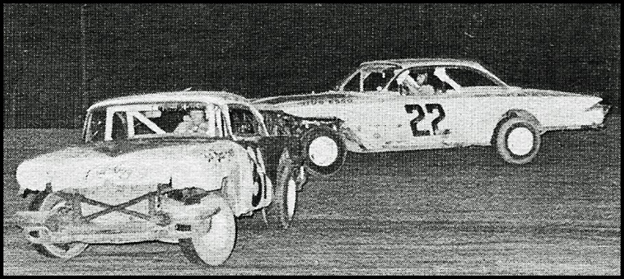 John Teale #31 gets out of Shape as Rick Aiello #22 passes on the outside at Merrittville Speedway. Courtesy of Wheelspin News