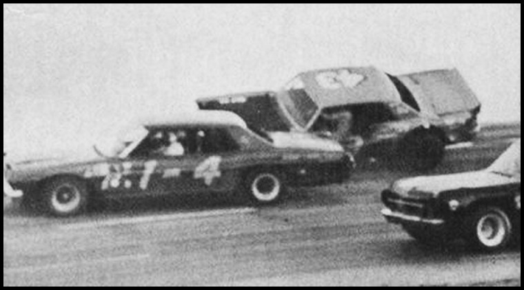 Don Biederman and Walt Zavitz going over the wall at Cayuga . Zavitz drove back around and they let him back in the pit gate. Courtesy of Wheelspin News