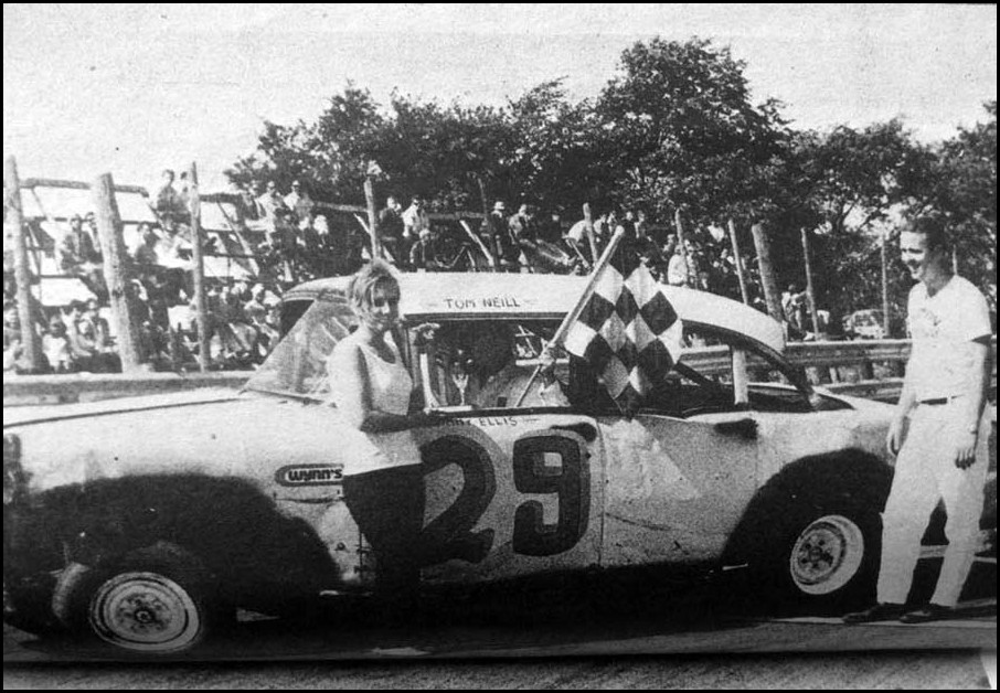Tom Neill takes the Checkers at Acton Speedway 1970. Courtesy of Glen Tustin